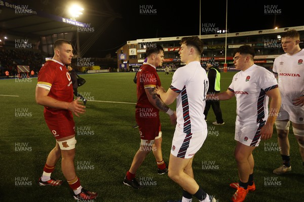 140325 - Wales U20s v England U20s - U20s Six Nations Championship - Wales players shake hands at full time