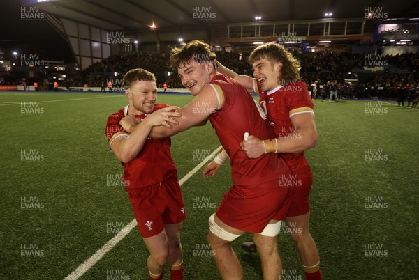 140325 - Wales U20s v England U20s - U20s Six Nations Championship - Tom Bowen, Deian Gwynne and Aidan Boshoff of Wales celebrate at full time