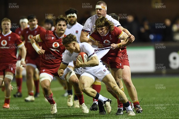 140325 - Wales U20 v England U20 - Six Nations Chamionship - Aidan Boshoff of Wales U20s is challenged by Nic Allison of England U20s