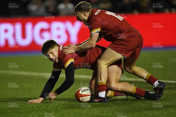 140325 - Wales U20 v England U20 - Six Nations Chamionship - Steffan Emanuel of Wales U20s celebrates scoring a try with team mates