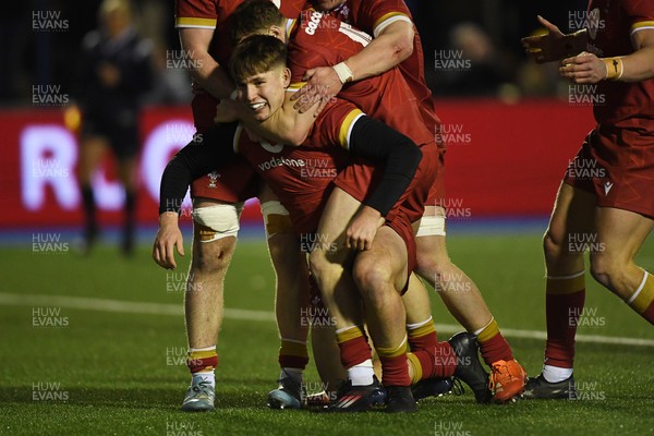 140325 - Wales U20 v England U20 - Six Nations Chamionship - Steffan Emanuel of Wales U20s celebrates scoring a try with team mates