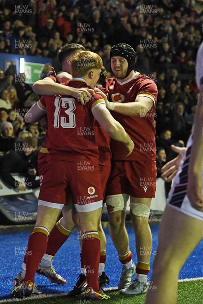 140325 - Wales U20 v England U20 - Six Nations Chamionship - Harry Rees-Weldon of Wales U20s celebrates scoring a try with team mates