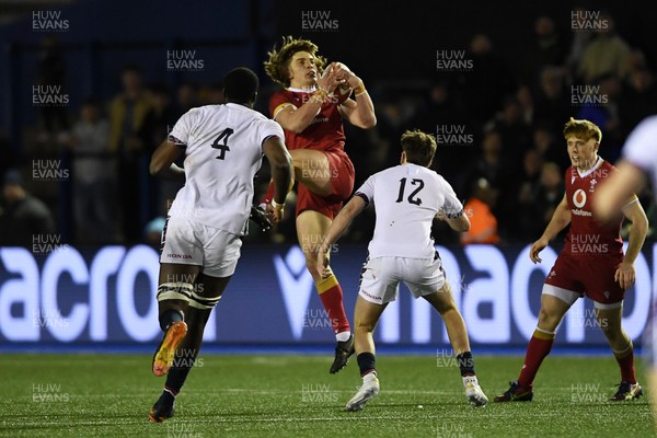 140325 - Wales U20 v England U20 - Six Nations Chamionship - Aidan Boshoff of Wales U20s is challenged by Nic Allison of England U20s