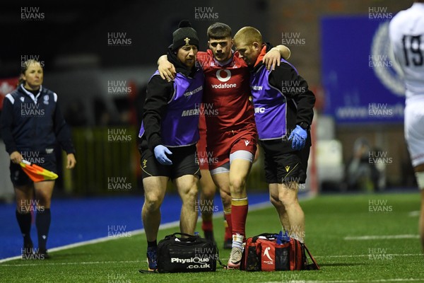 140325 - Wales U20 v England U20 - Six Nations Chamionship - Harry Rees-Weldon of Wales U20s leaves the field injured