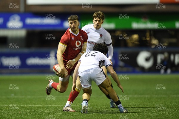 140325 - Wales U20 v England U20 - Six Nations Chamionship - Harry Rees-Weldon of Wales U20s is challenged by Josh Bellamy of England U20s