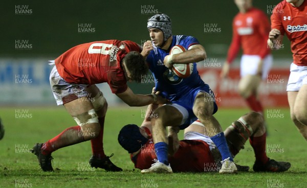 160318 - Wales U20s v France U20s - Natwest 6 Nations Championship - Clement LaPorte of France is tackled by Taine Basham of Wales