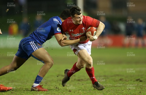160318 - Wales U20s v France U20s - Natwest 6 Nations Championship - Ryan Conbeer of Wales is tackled by Matthis Lebel of France
