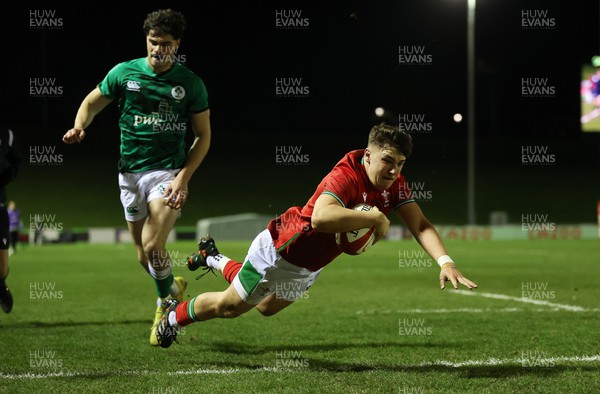 030223 - Wales U20s v Ireland U20s - U20s 6 Nations Championship - Llien Morgan of Wales dives over the line to score a try
