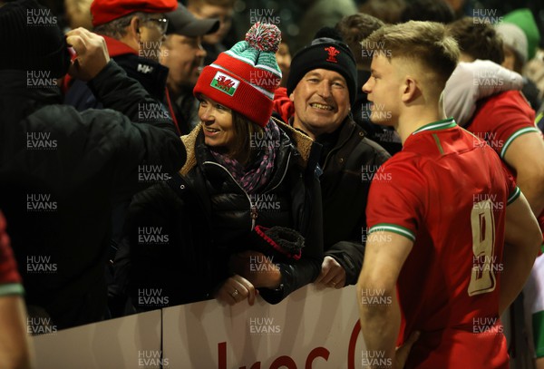 030223 - Wales U20s v Ireland U20s - U20s 6 Nations Championship - Archie Hughes of Wales with family and friends after the game