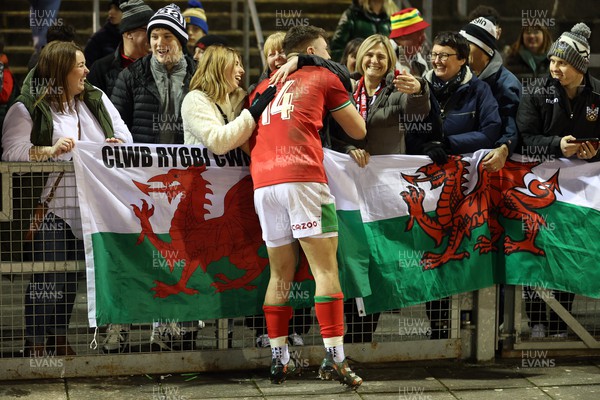030223 - Wales U20s v Ireland U20s - U20s 6 Nations Championship - Llien Morgan of Wales with family and friends after the game