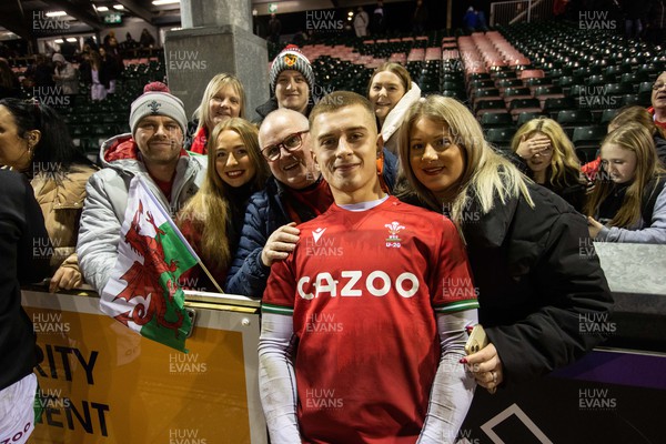 030223 - Wales U20s v Ireland U20s - U20s 6 Nations Championship - Cameron Winnett of Wales with family and friends after the game