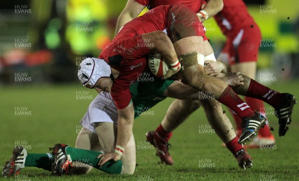 130315 - Wales U20s v Ireland U20s - RBS 6 Nations - Jon Fox of Wales is tackled by Sam Arnold of Ireland