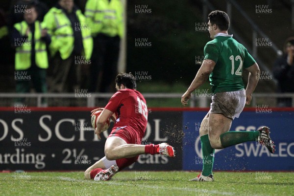 130315 - Wales U20s v Ireland U20s - RBS 6 Nations - Owen Watkin of Wales runs in to score a try