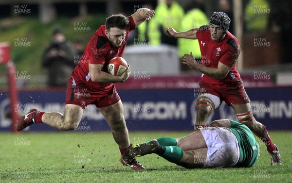 130315 - Wales U20s v Ireland U20s - RBS 6 Nations - Dillon Lewis of Wales is tackled by Jeremy Loughman of Ireland