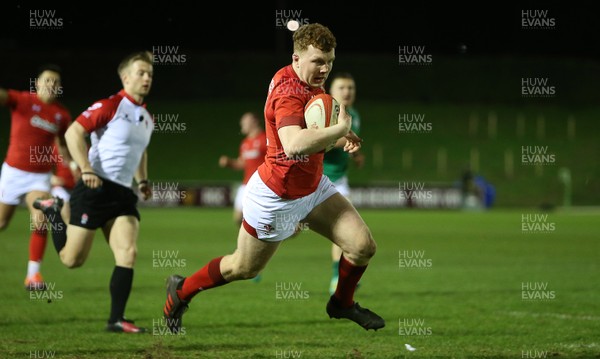 150319 - Wales U20s v Ireland U20s - U20s 6 Nations Championship - Aneurin Owen of Wales runs in to score a try