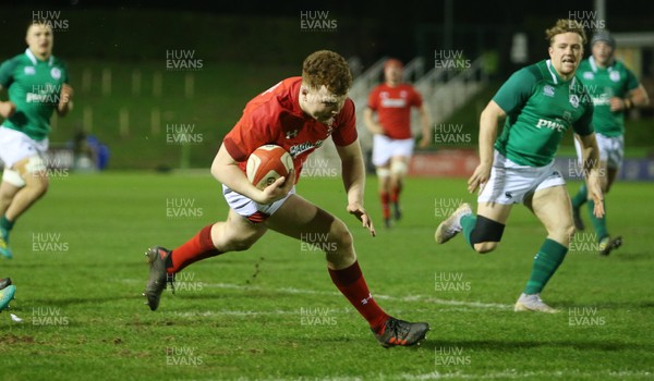 150319 - Wales U20s v Ireland U20s - U20s 6 Nations Championship - Aneurin Owen of Wales runs in to score a try