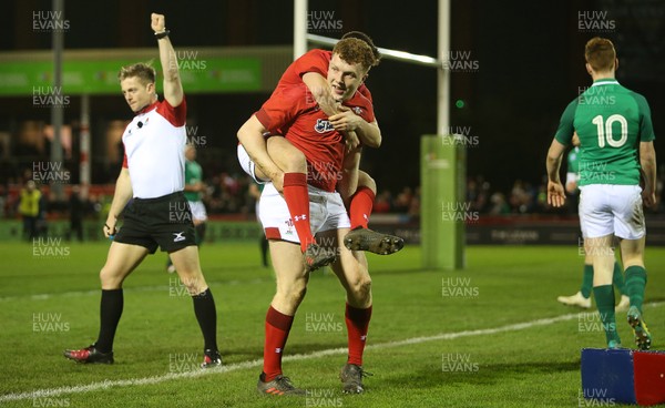 150319 - Wales U20s v Ireland U20s - U20s 6 Nations Championship - Aneurin Owen of Wales celebrates scoring a try with Dafydd Buckland