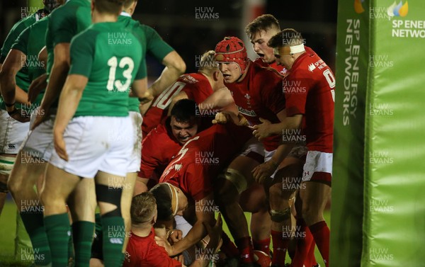 150319 - Wales U20s v Ireland U20s - U20s 6 Nations Championship - Jac Morgan of Wales celebrates scoring a try with team mates