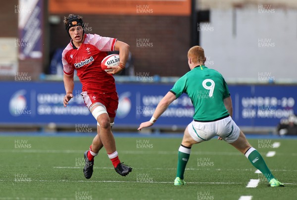 250621 - Wales U20s v Ireland U20s - U20s 6 Nations Championship - Alex Mann of Wales takes on Nathan Doak of Ireland