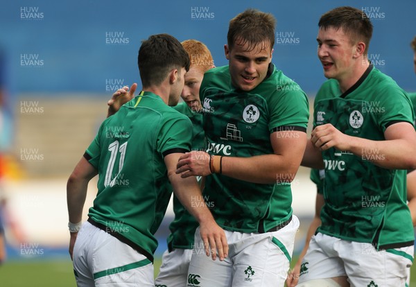 250621 - Wales U20 v Ireland U20, U20 Six Nations - Chris Cosgrave of Ireland is congratulated by team mates after he races in to score the second try