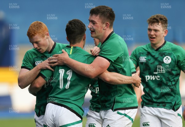 250621 - Wales U20 v Ireland U20, U20 Six Nations - Chris Cosgrave of Ireland is congratulated by team mates after he races in to score the second try
