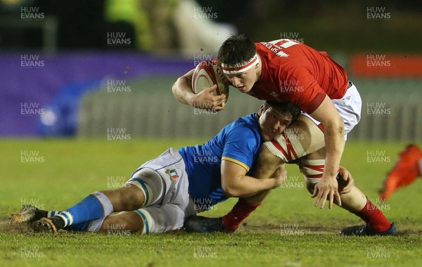 090318 - Wales U20s v Italy U20s - Natwest 6 Nations Championship - Owen Lloyd of Wales is tackled by Michele Lamaro of Italy