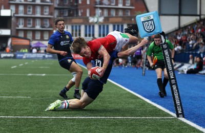 130625 - Wales U20s v Italy U20s - Friendly - Aidan Boshoff of Wales leaps over the line to score a try