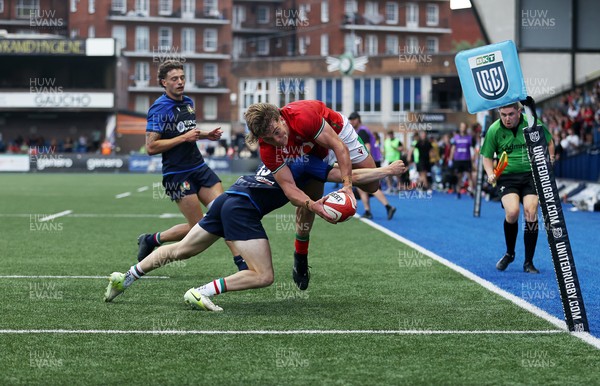 130625 - Wales U20s v Italy U20s - Friendly - Aidan Boshoff of Wales leaps over the line to score a try