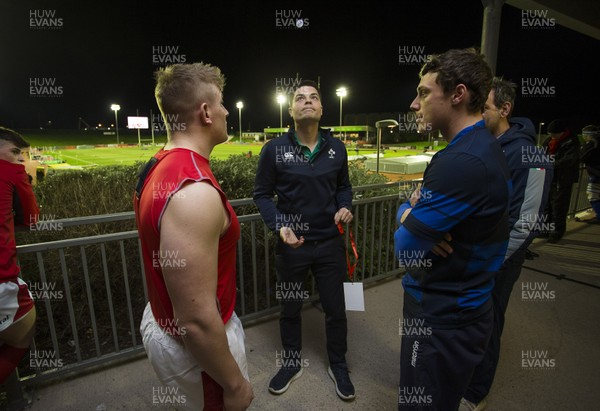 310120 - Wales U20s v Italy U20s - U20s 6 Nations Championship - Captains Jac Morgan of Wales and Paolo Garbisi of Italy with Referee Chris Busby during the coin toss