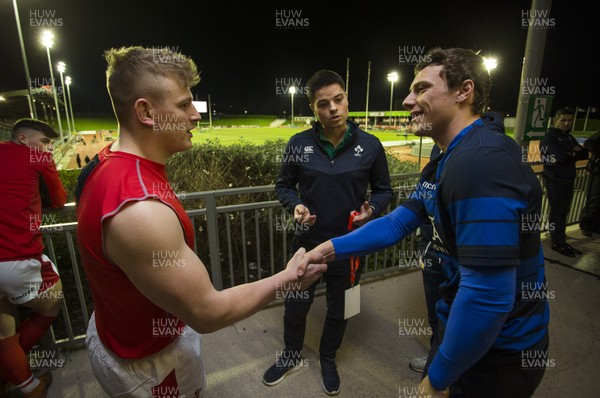 310120 - Wales U20s v Italy U20s - U20s 6 Nations Championship - Captains Jac Morgan of Wales and Paolo Garbisi of Italy with Referee Chris Busby during the coin toss
