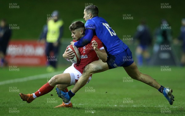 310120 - Wales U20s v Italy U20s - U20s 6 Nations Championship - Ewan Rosser of Wales is tackled by Jacopo Trulla of Italy