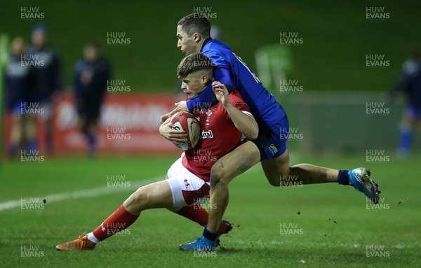 310120 - Wales U20s v Italy U20s - U20s 6 Nations Championship - Ewan Rosser of Wales is tackled by Jacopo Trulla of Italy