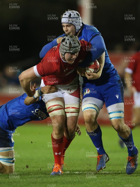 310120 - Wales U20s v Italy U20s - U20s 6 Nations Championship - Jac Price of Wales is tackled by Gianmarco Lucchesi of Italy