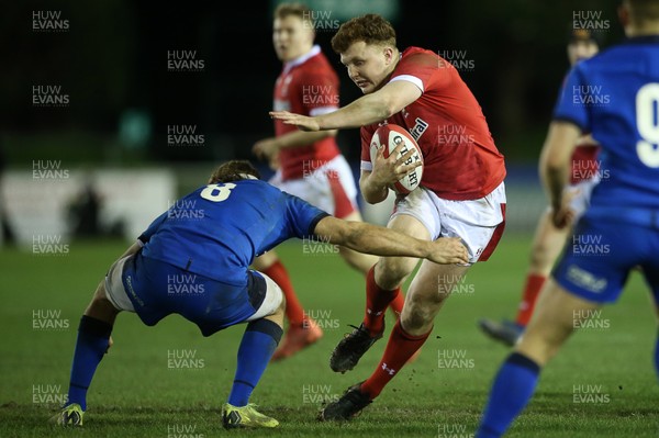 310120 - Wales U20s v Italy U20s - U20s 6 Nations Championship - Aneurin Owen of Wales is tackled by Matteo Drudi of Italy