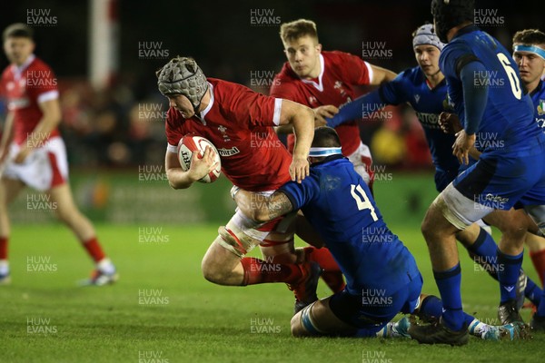 310120 - Wales U20s v Italy U20s - U20s 6 Nations Championship - Jac Price of Wales is tackled by Andrea Zambonin of Italy
