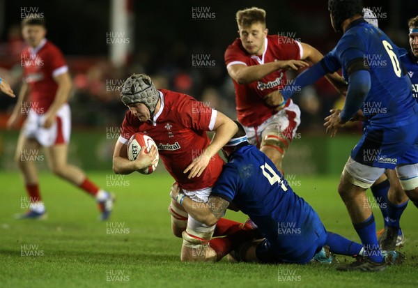 310120 - Wales U20s v Italy U20s - U20s 6 Nations Championship - Jac Price of Wales is tackled by Andrea Zambonin of Italy
