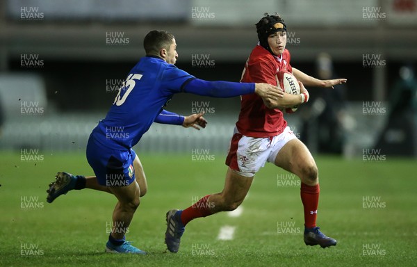 310120 - Wales U20s v Italy U20s - U20s 6 Nations Championship - Dan John of Wales is tackled by Jacopo Trulla of Italy