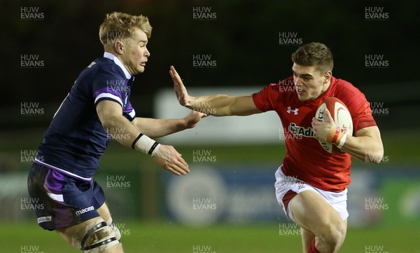 020218 - Wales U20s v Scotland U20s - Natwest 6 Nations - Corey Baldwin of Wales is tackled by Archie Erskine of Scotland