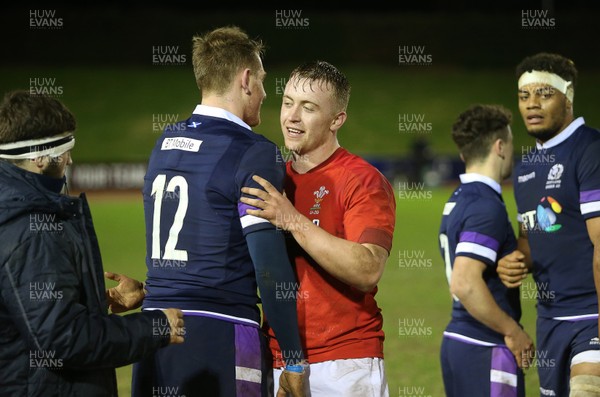 020218 - Wales U20s v Scotland U20s - Natwest 6 Nations - Tommy Reffell of Wales shakes hands with Stafford McDowell of Scotland