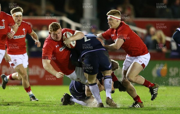 020218 - Wales U20s v Scotland U20s - Natwest 6 Nations - Rhys Carre of Wales is tackled by Robbie Smith of Scotland