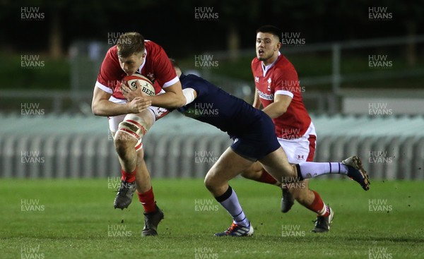 130320 - Wales U20s v Scotland U20s - U20s 6 Nations Championship - Ben Carter of Wales is tackled by Rory Darge of Scotland