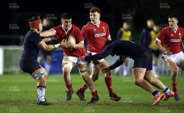 130320 - Wales U20s v Scotland U20s - U20s 6 Nations Championship - Morgan Strong of Wales is tackled by Connor Boyle of Scotland