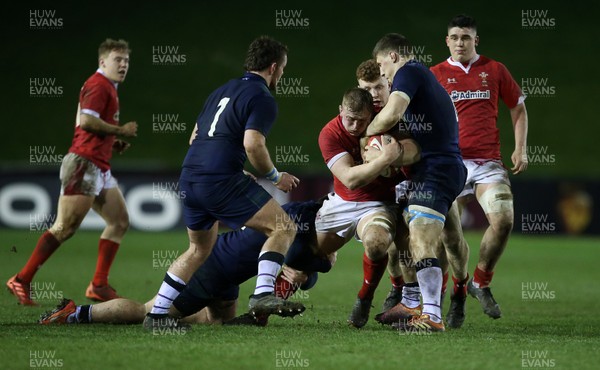 130320 - Wales U20s v Scotland U20s - U20s 6 Nations Championship - Jac Morgan of Wales is tackled by Rory Darge of Scotland