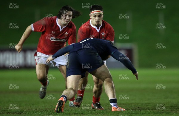 130320 - Wales U20s v Scotland U20s - U20s 6 Nations Championship - Dom Booth of Wales is tackled by Ewan Ashman of Scotland