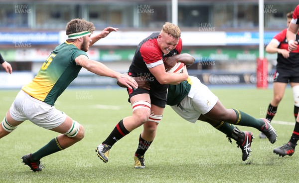 080518 - Wales U20s v South Africa U20s - International Friendly - Ben Fry of Wales is tackled by Sazi Sandi of South Africa
