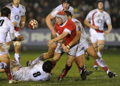 13.02.09 - Wales U20 v England U20 - Under 20 Six Nations 2009 - Wales' Aaron Coundley is stopped by the English defence. 
