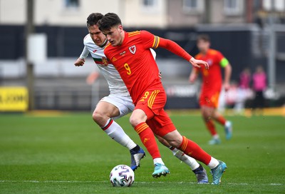 290322 - Wales U21 v Bulgaria U21 - 2023 UEFA Under 21 Euro Qualifying Round - Jack Vale of Wales is tackled by Simeon Petrov of Bulgaria