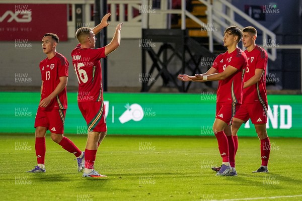 080925 - Wales U21 v Denmark U21 - 2027 UEFA U21 EURO Qualifying - Christopher Popov of Wales U-21 celebrates scoring his teams second goal of the match with teammate Jonathan Bland 