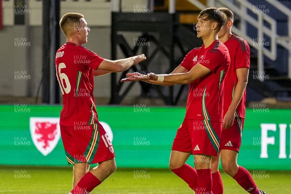 080925 - Wales U21 v Denmark U21 - 2027 UEFA U21 EURO Qualifying - Christopher Popov of Wales U-21 celebrates scoring his teams second goal of the match with teammate Jonathan Bland 