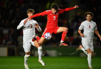201123 - Wales U21 v Denmark U21 - European Under-21 Championship 2025 Qualifier - Owen Beck of Wales is challenged by Thomas Kristensen of Denmark